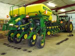 Each planter row has unique sets of wheels - each with their own purpose, be it clearing away trash from the seed slot or closing up the earth behind it.