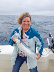 Janice shows off her impressive fish catch.
