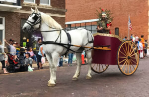 Phil has fun dressed as a Roman soldier in a horse-drawn chariot at the Heritage Days Parade in McCook, Nebraska