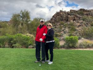 Phil and Janice enjoy some time out on the golf course.