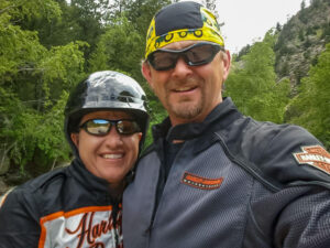 Phil and Janice stop for a selfie while on a motorcycle ride.