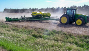 Our planter stirs up a bit of dust on it's way through the field.