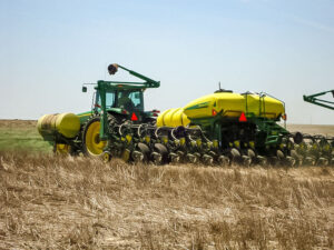 The backside view of our corn planter as it makes it's way through the wheat straw.