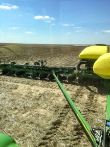 The view out of the back window of the planting tractor gives us real time feedback on the planting progress behind us.