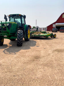 Our tractor and mower are ready to tackle some brush.